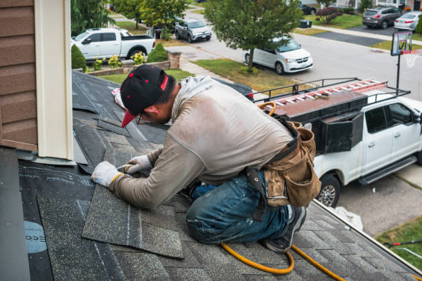 Professional Roof Replacement technician working in East Springfield, OH